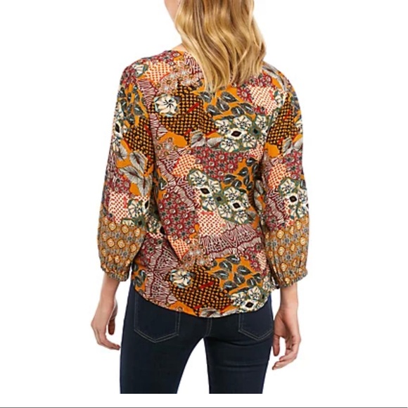 New Directions®
3/4 Sleeve Button Down Textured Tie Front Top
UPC: 0682173170317 - Picture 2 of 3